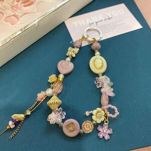 Vintage-inspired purple Floral Phone Strap